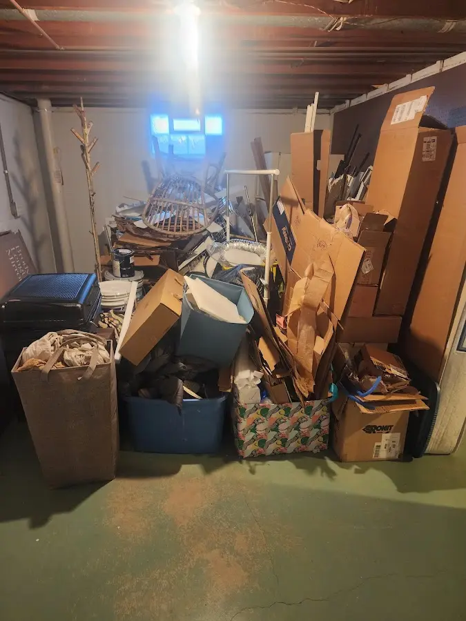 Roll-off dumpster container at job site for 15 Yard Dumpster Rental in Camden